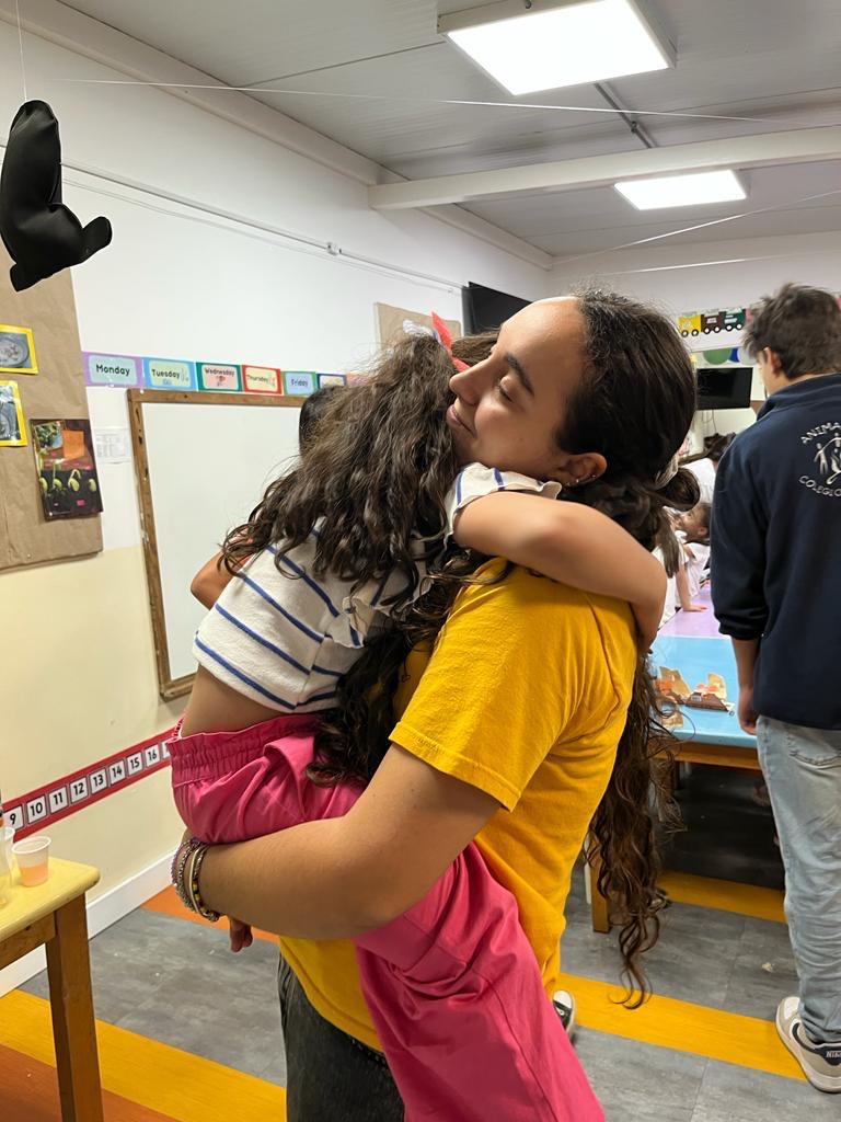 Foto abrazo equipo
